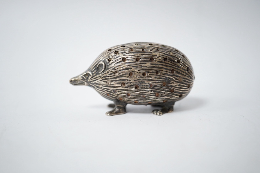 An Edwardian novelty silver pin cushion, modelled as a hedgehog, Adie & Lovekin Ltd, Birmingham, 1906, 52mm. Condition - fair to good